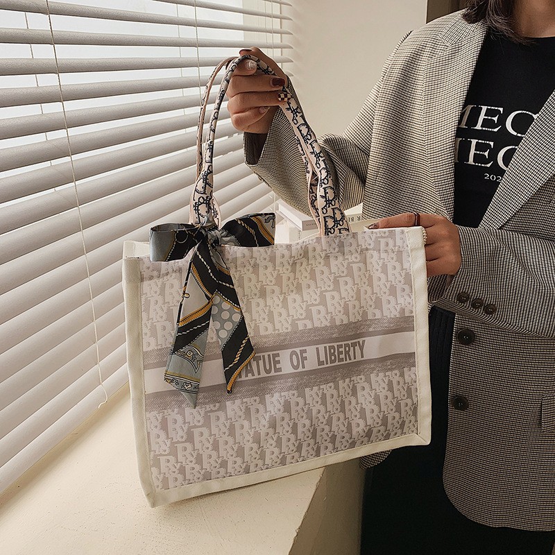 Bolsa de hombro de lona de gran capacidad bufanda de seda casual de mujer nueva moda bolsa de compras estudiante cubo Portátil Bolsa de maquillaje cuadrado