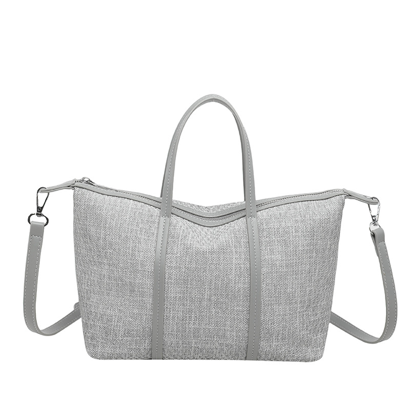 Bolsa de mano de gran capacidad de viaje coreano para mujeres 2026 nueva moda de verano simple bolsa de hombro retro