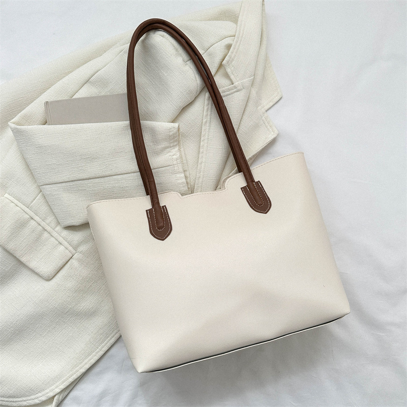 Estilo coreano versátil bolso texturizado de las mujeres 2023 otoño e invierno nuevo hombro axila bolsa popular bolsa de asas este año