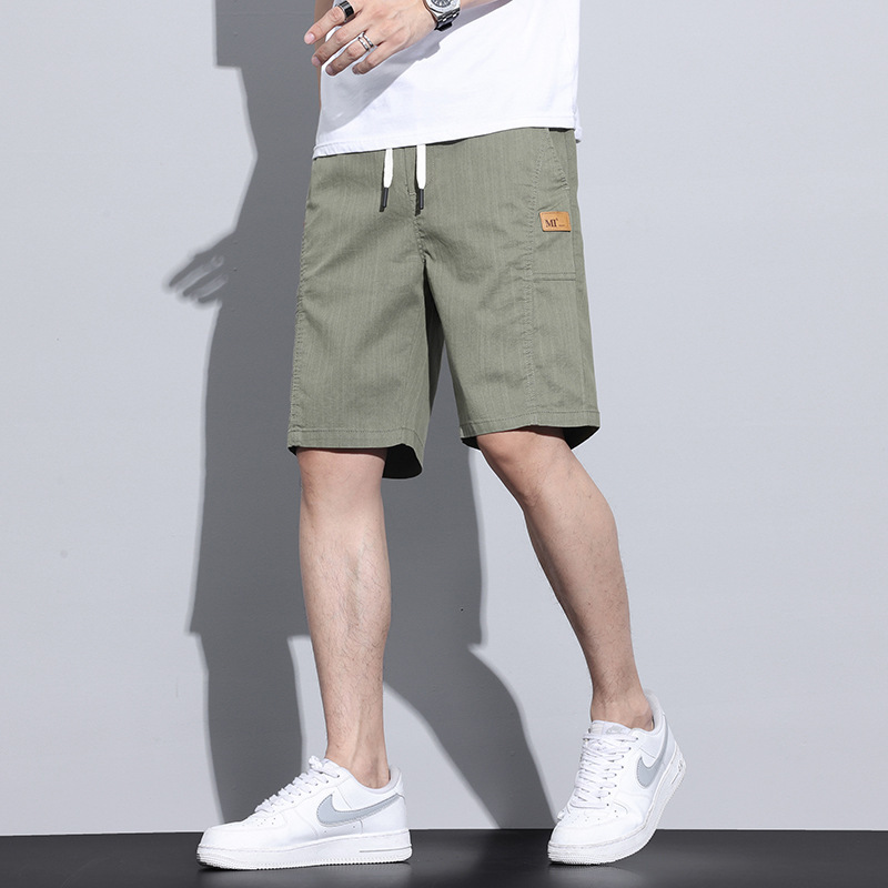 Pantalones cortos de seda de hielo para niños pantalones casuales transpirables delgados de verano 2025 nuevos pantalones de cinco puntos sueltos rectos para hombres