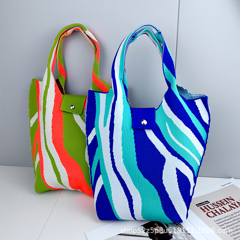 包包女韩版小众设计高级感针织单肩包手提包编织包外出通勤水桶包