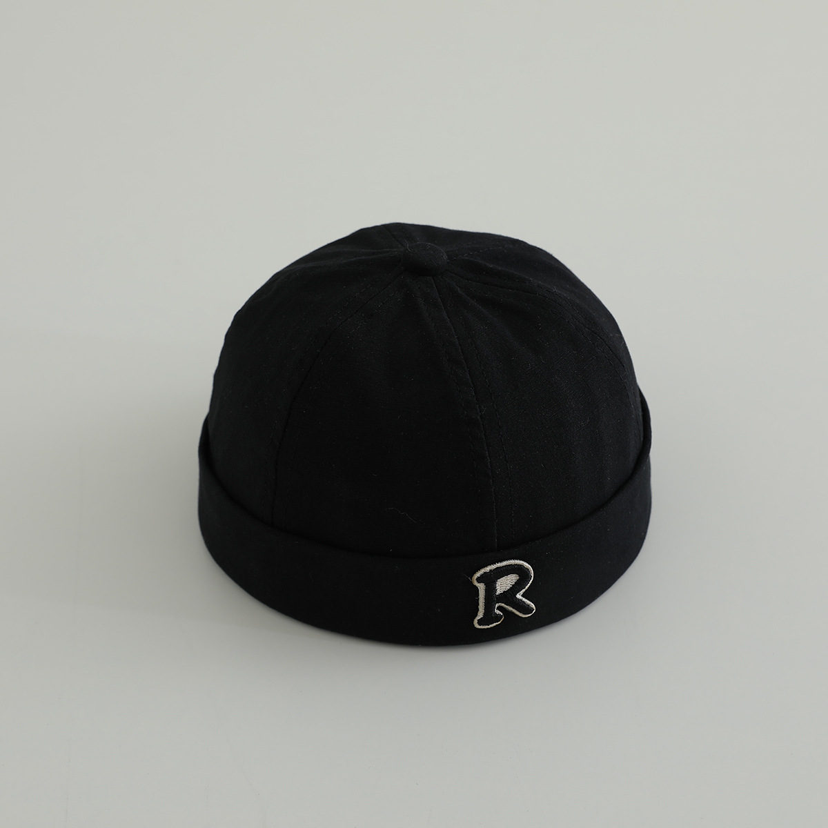 Primavera niños terratenientes sombreros hombres y mujeres letras de la marea sin bordes sombreros de piel de melón sombreros de calabaza sombreros de boina de personalidad