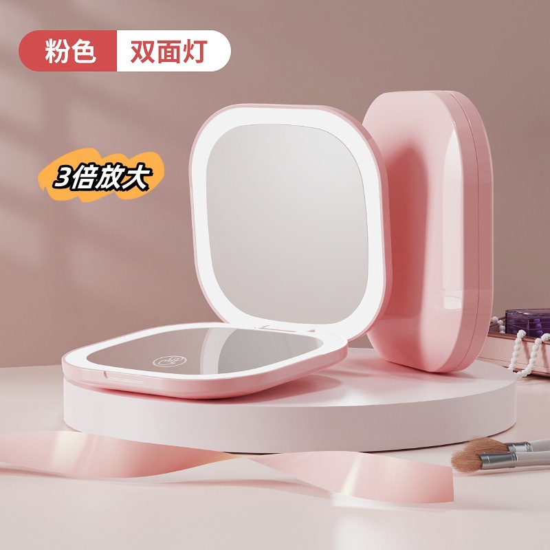 Los espejos de maquillaje LED de los fabricantes transfronterizos se pueden recargar en vivo con el mismo espejo de maquillaje para estudiantes de alta definición, apariencia compacta y portátil z