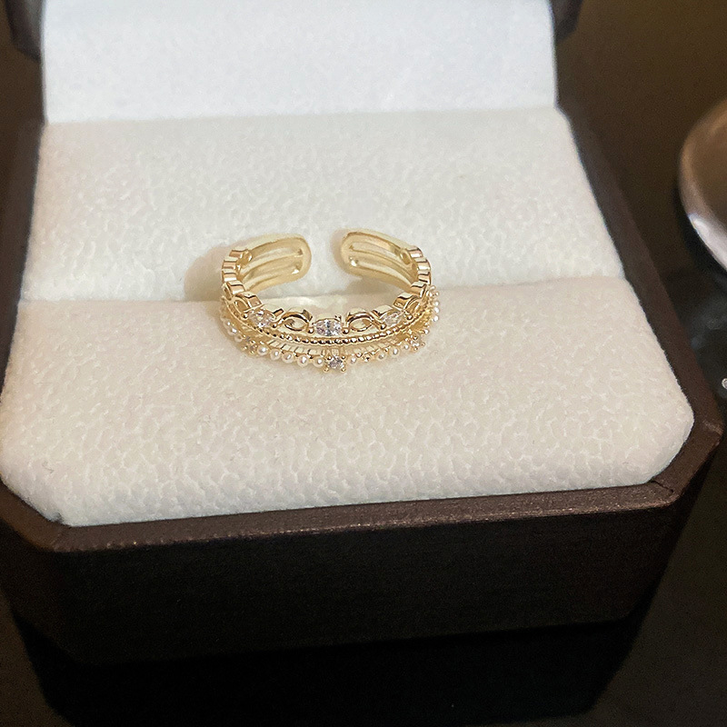 レトロな円形の緑松石の開口指輪の宮廷風の大衆の設計のファッション的な指輪の軽い贅沢な高級感の食指の指輪