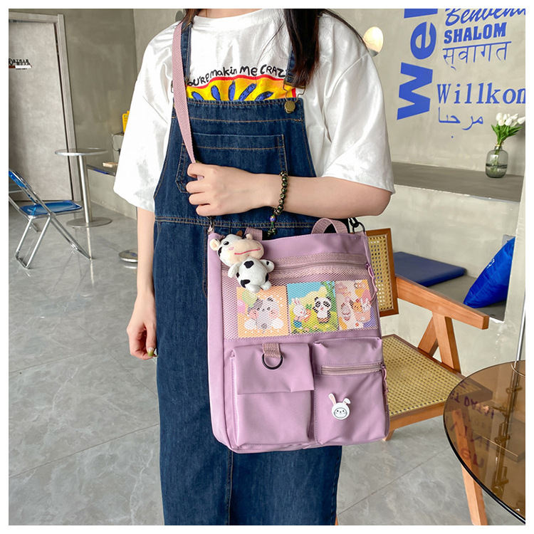 Large-capacity Japanese-style single-shoulder canvas bag for girls, versatile crossbody, ins, a tote bag for junior high school students' classes, and a schoolbag for after-school tutoring undefined