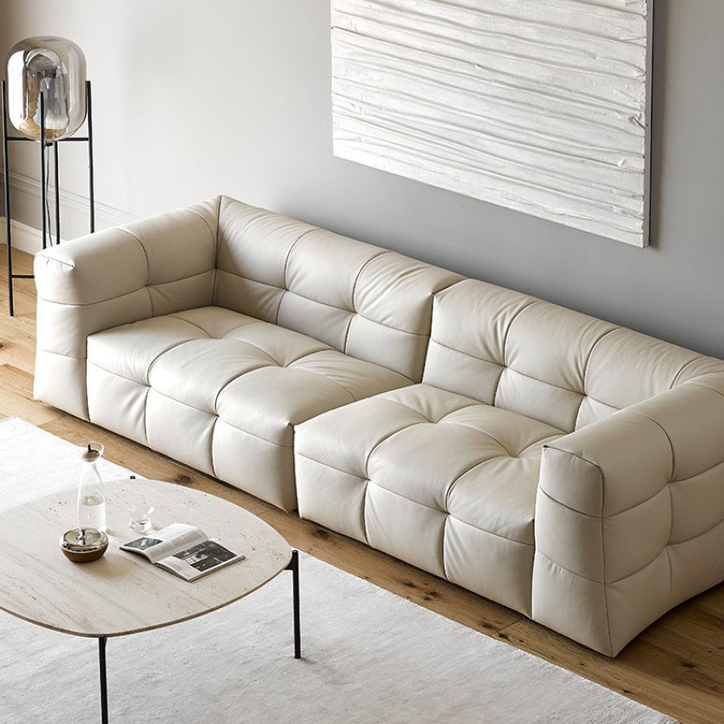 Italian-style minimalist black straight-row leather marshmallow sofa&mdash;modern, light-luxury, internet-famous cream-colored sofa with subtle accents for the living room.