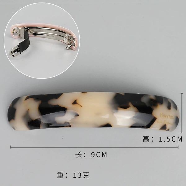 Light tortoise shell spring clip