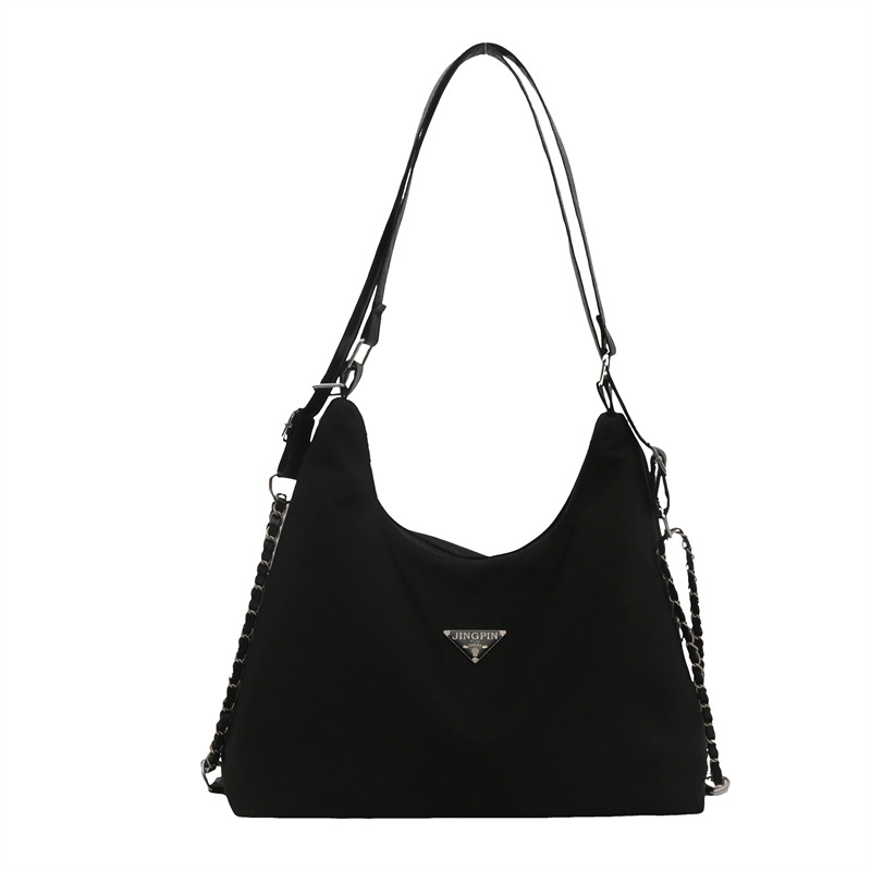 Mochila de viaje negra para mujer 2024 nuevo bolso de hombro de moda de gran capacidad y multiusos biselado