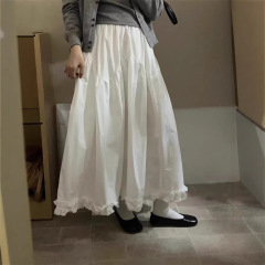 2025春の白いハスの葉の辺のa字のスカートの半身のスカートの女性のファッションはやせていて腰の質感の潮流の韓