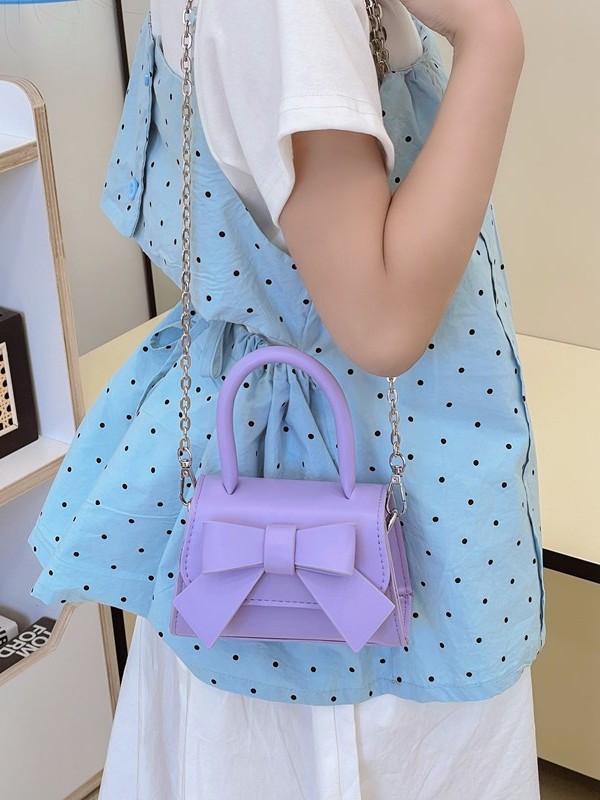 Bolso de mujer 2025 tendencia de primavera nuevo arco de moda para niños bolso de hombro de estilo extranjero bolso de mano