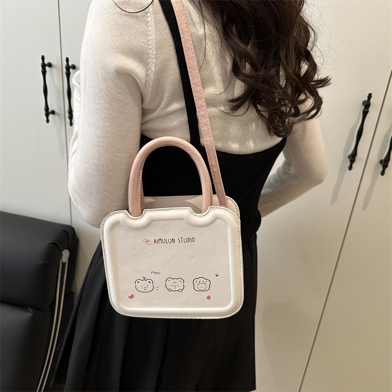 Bolso pequeño de nicho femenino 2025 primavera y verano nuevo estilo bolso bandolera de textura blanca con sentido de diseño bolso de galleta portátil pequeño bolso cuadrado