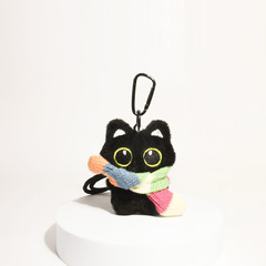 かわいい黒い猫のかばんのストラップのぬいぐるみの車のキーホルダーは学生にプレゼントします。