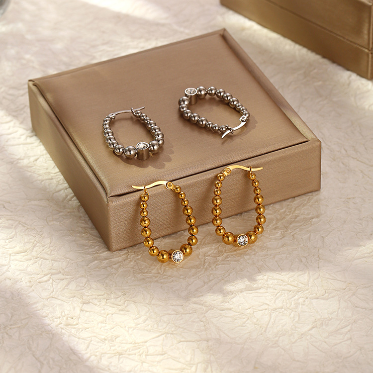 Pendientes de bola de acero inoxidable de moda europea y americana pendientes de bola de acero inoxidable retro de mujer de moda simple de acero de titanio de 18K pendientes