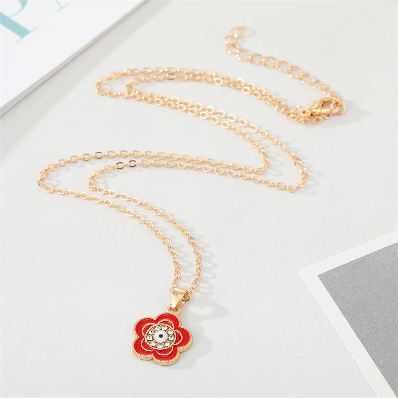 Retro Point Rhinestone Eye Flower Pendant Alloy Necklace Wholesale display picture 3