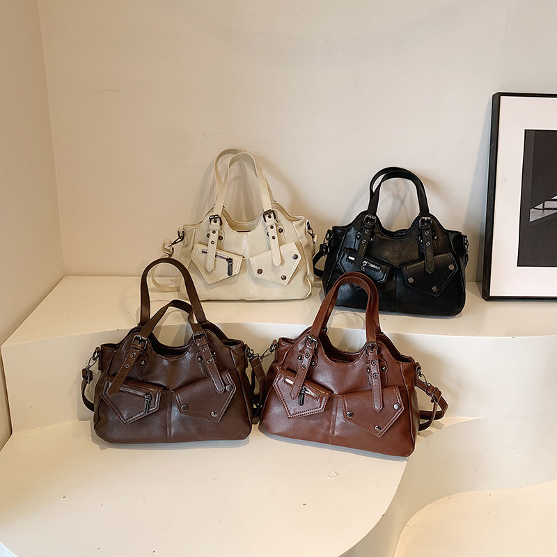 2024 transfronterizo retro Europa y América de gran capacidad bolso de hombro nuevo bolso de mochila empalmado bolso de mujer simple bolso de remaches bolso de mujer