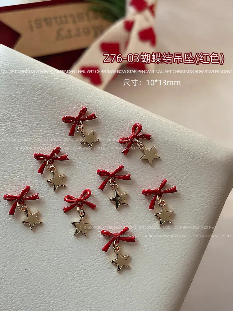 Navidad arco joyas de manicura otoño y invierno nuevo tipo de alta protección de color pentagonal aleación colgante tridimensional accesorios de uñas