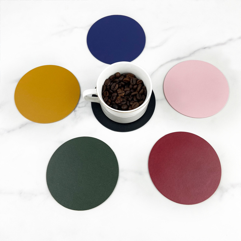 Transfronterizo puede fijar LOGO doble cara espesa pu cojín de cuero aislante de taza de té redondo impermeable antideslizante al por mayor