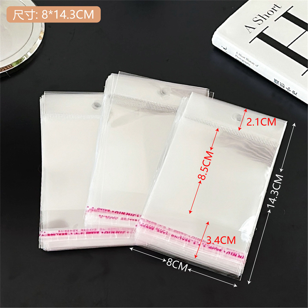 Colección de bolsas opp transparentes, cabeza de tarjeta, bolsa de embalaje trasera, bolsa de joyería pequeña, bolsa autoadhesiva con orificio colgante, bolsa de embalaje de plástico al por mayor