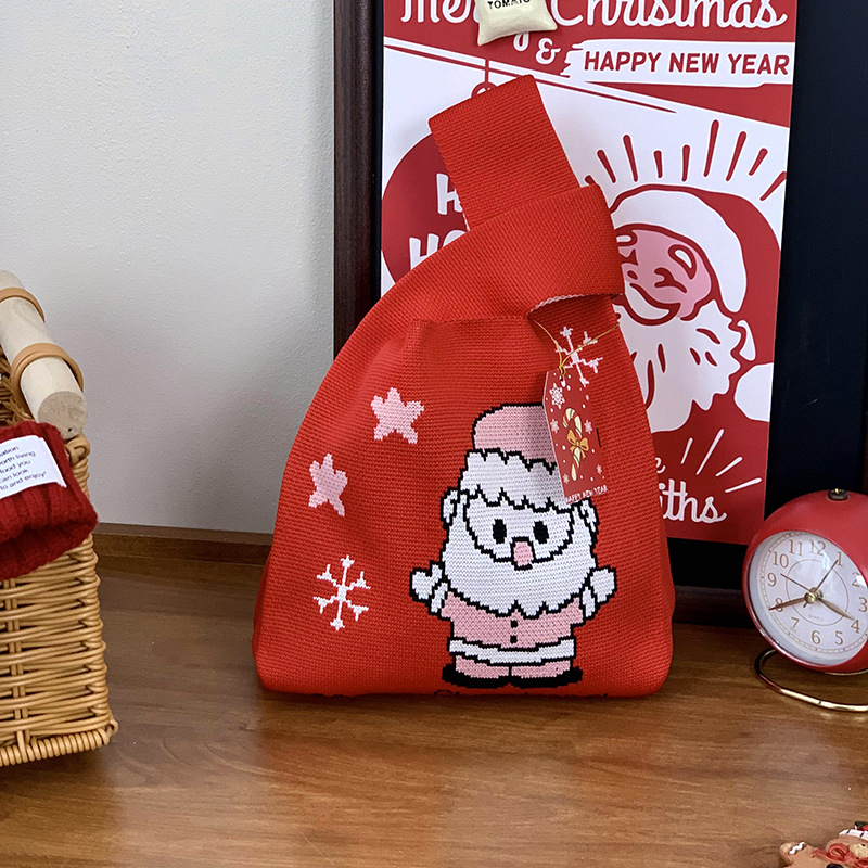 Bolsas de tejido de Navidad al por mayor bolsas de regalo de Nochebuena bolsas de dulces bolsas de regalo de empresa bolsas de mano creativas