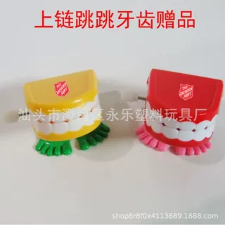 生产定制各种上链跳跳牙齿玩具 可印LOGO上发条跳走路牙赠品