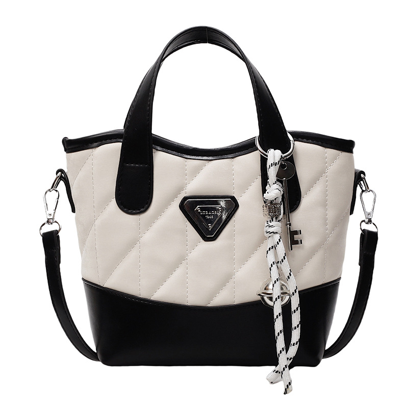 Bolso de cubo portátil de diamante de fuego súper caliente para mujer 2025 nueva tendencia bolso de hombro de todo fósforo bolso de mensajero de moda de nicho transfronterizo