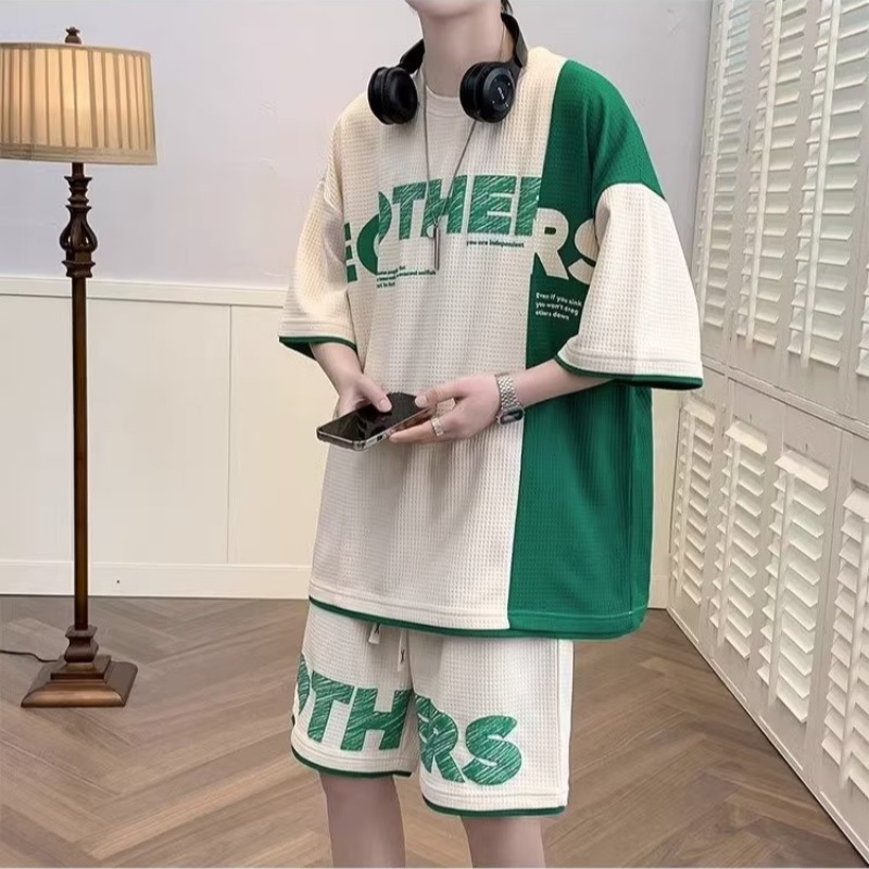 Camisa menos ropa estilo Hong Kong traje suelto verano nuevo color a juego personalidad juventud waffle media manga conjunto de dos piezas