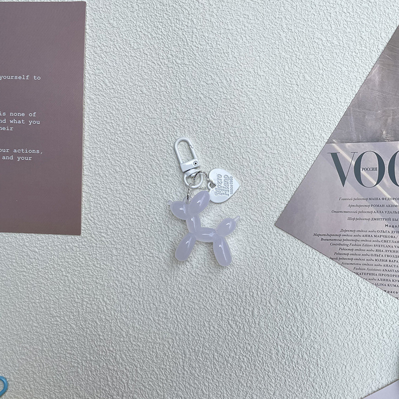 Pequeño Libro Rojo mismo lindo jalea globo láser perro llavero colgante colorido cachorro de dibujos animados teléfono llavero