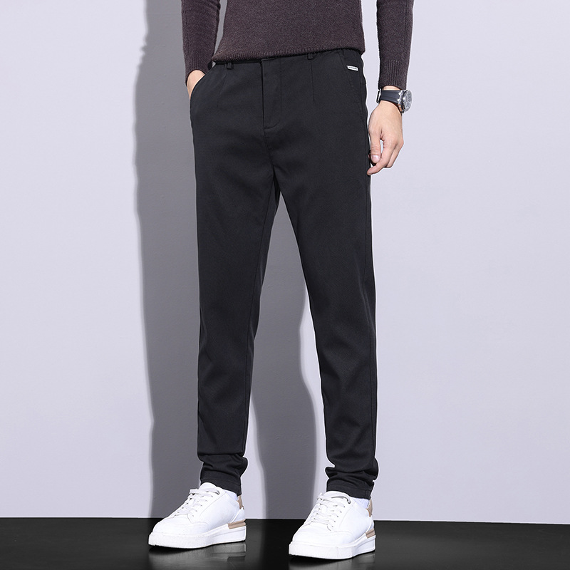 Pantalones juveniles populares para hombres casuales Otoño e Invierno nuevos pantalones antiarrugas resistentes al desgaste pantalones de todos los partidos juveniles elásticos pantalones casuales cómodos