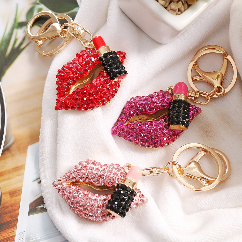 New European and American style rhinestone-encrusted lip pendant metal keychain 3D lipstick bag key chain small gift wholesale