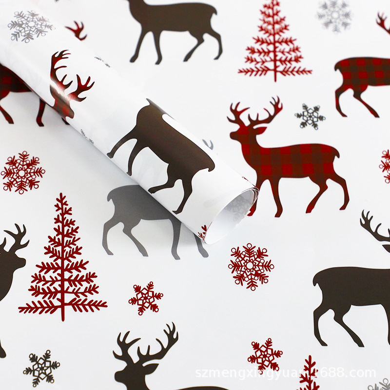 Nuevo regalo de vacaciones de Navidad regalo de dibujos animados niños caja de regalo papel de regalo decorativo papel de regalo papel de color rojo y verde