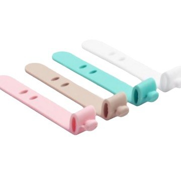 Correa de silicona de color caramelo anti-perdida Almacenamiento de auriculares cinta flexible cable de datos Cable de trampa organizador Winder
