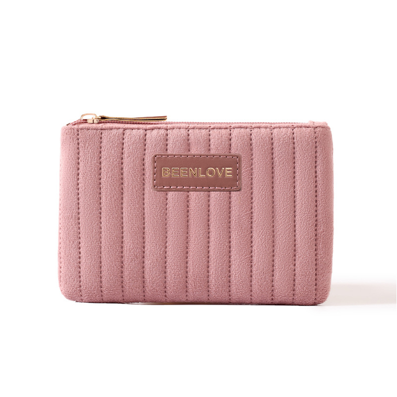 Nuevo paquete de maquillaje de terciopelo holandés transfronterizo de gran capacidad portátil para mujeres de alto valor de cosméticos de cuidado de la piel estriados bolsa de almacenamiento