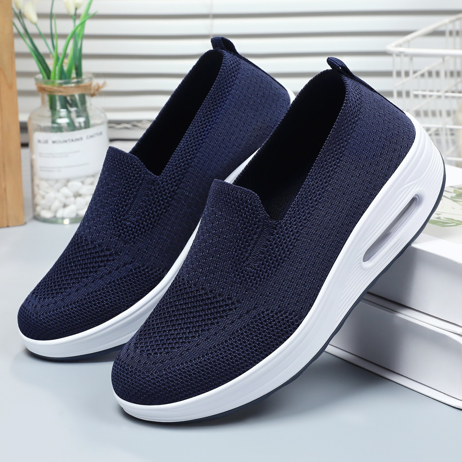 Zapatos de primavera para mujer, calzado casual transfronterizo, zapatos transpirables de punto, zapatos de suela blanda con amortiguación de aire que aumentan la altura, zapatos de malla cómodos para mujer