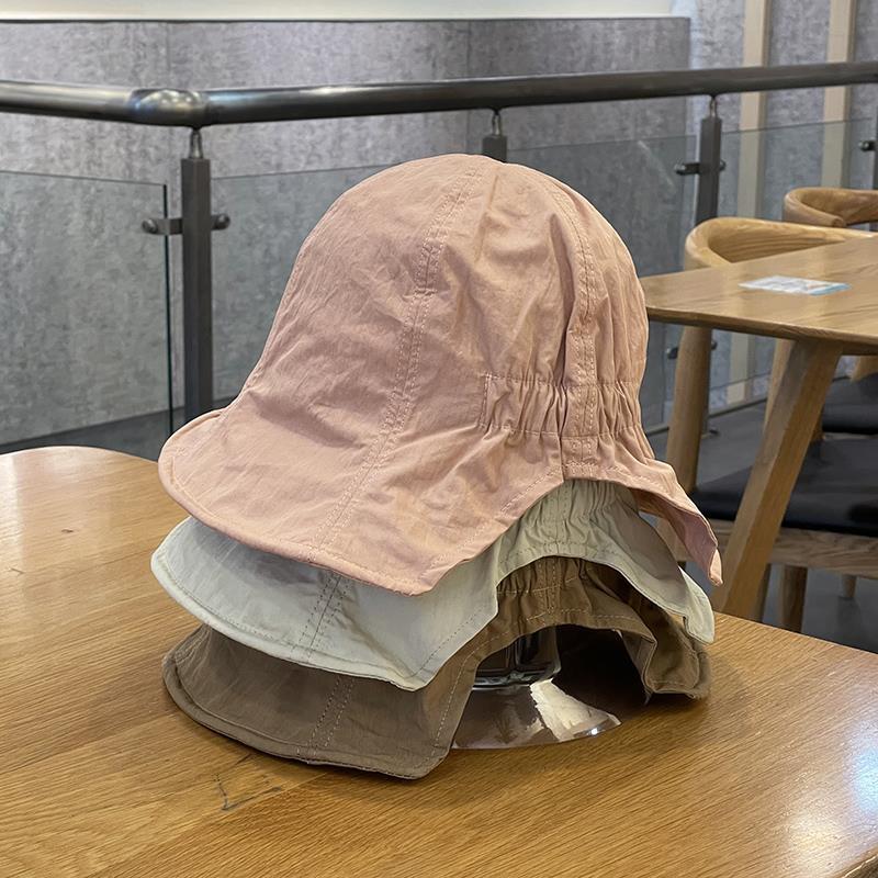 Quick-drying fisherman hat for women: spring/summer, sweet-style outdoor sun protection, lightweight, breathable, with a short brim—perfect for wearing with a ponytail, featuring an elastic band for a secure fit.