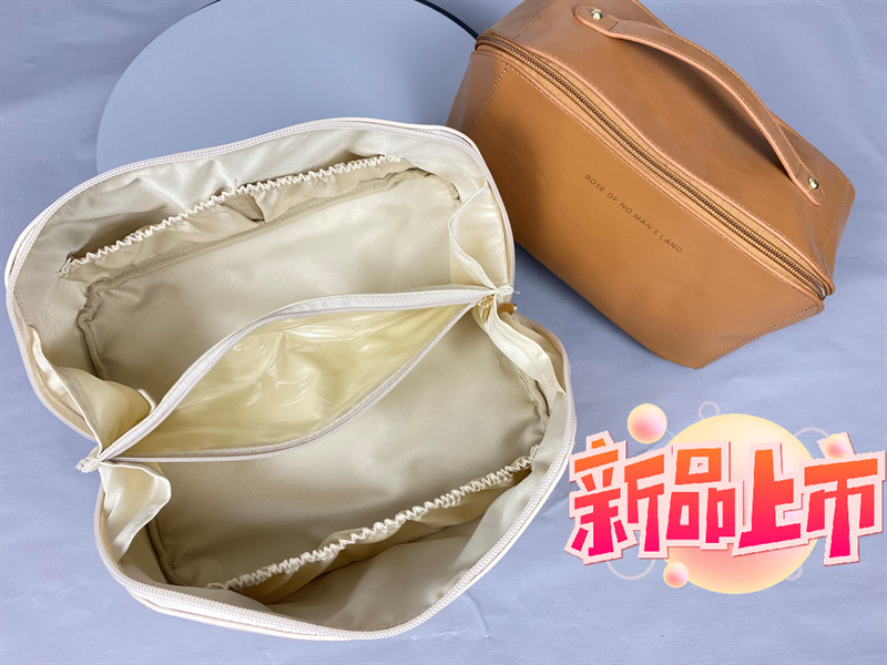 INS organ pu almohada bolsa de cosméticos de alta apariencia nueva bolsa de almacenamiento de cosméticos portátil para mujeres al por mayor de gran capacidad