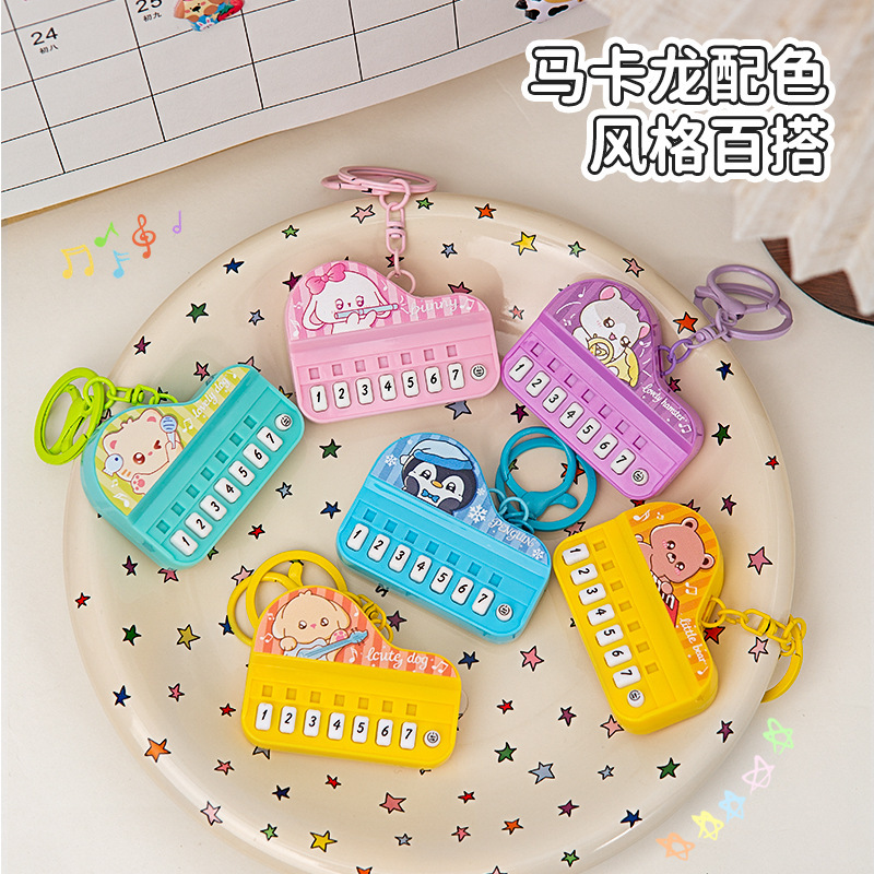 Creative Mini Piano Keychain Customized Luminous Handheld Music Electronic Keyboard Toy Student Bag Pendant Wholesale Creative Mini Piano Keychain Customized Luminous Handheld Music Electronic Keyboard Toy Student Bag Pendant Wholesale