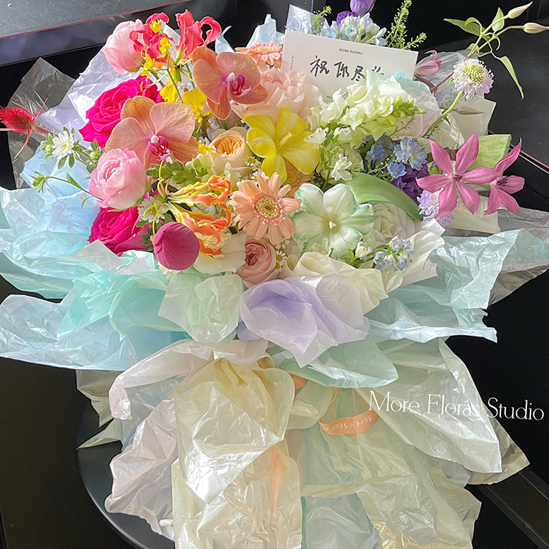 Fuente de agua fría papel de embalaje de flores engrosado impermeable película de vidrio perlada de alto nivel de sensación de ramo de flores material de florista