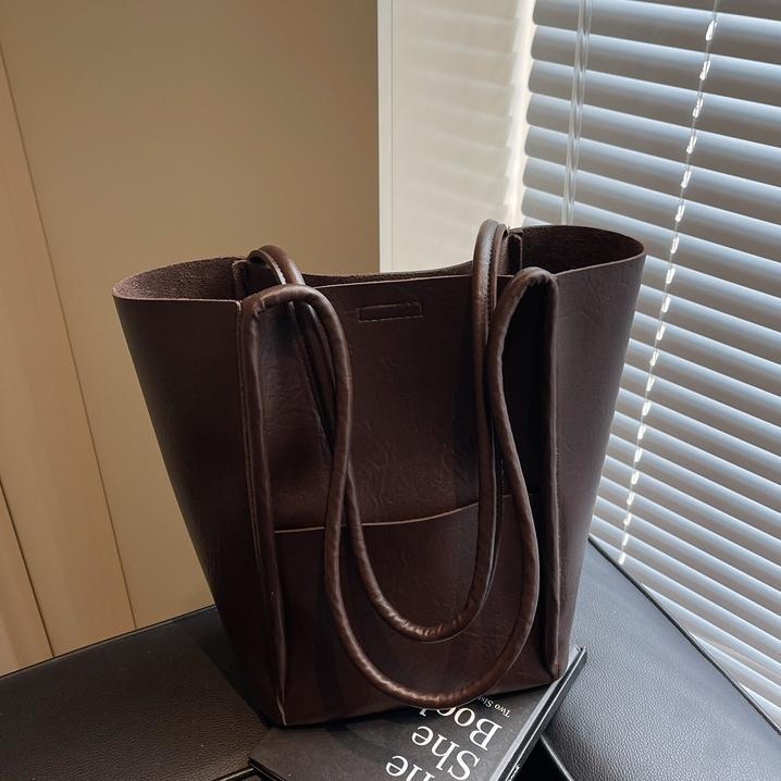 Bolsos de balde transfronterizos para niños 2024 nuevos bolsos de mujer de alto nivel retro bolsos de hombro bolsos de mano simples casuales