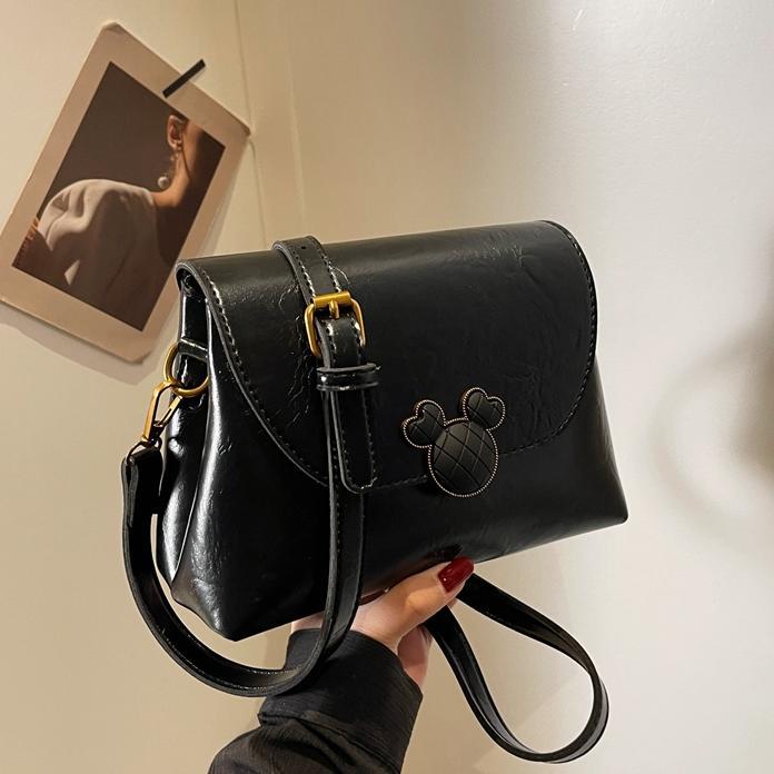 Este año, la popularidad de bolsos retrógrados para mujeres 2024 otoño y invierno nuevo bolso cuadrado de textura superior, bolso de mochila simple