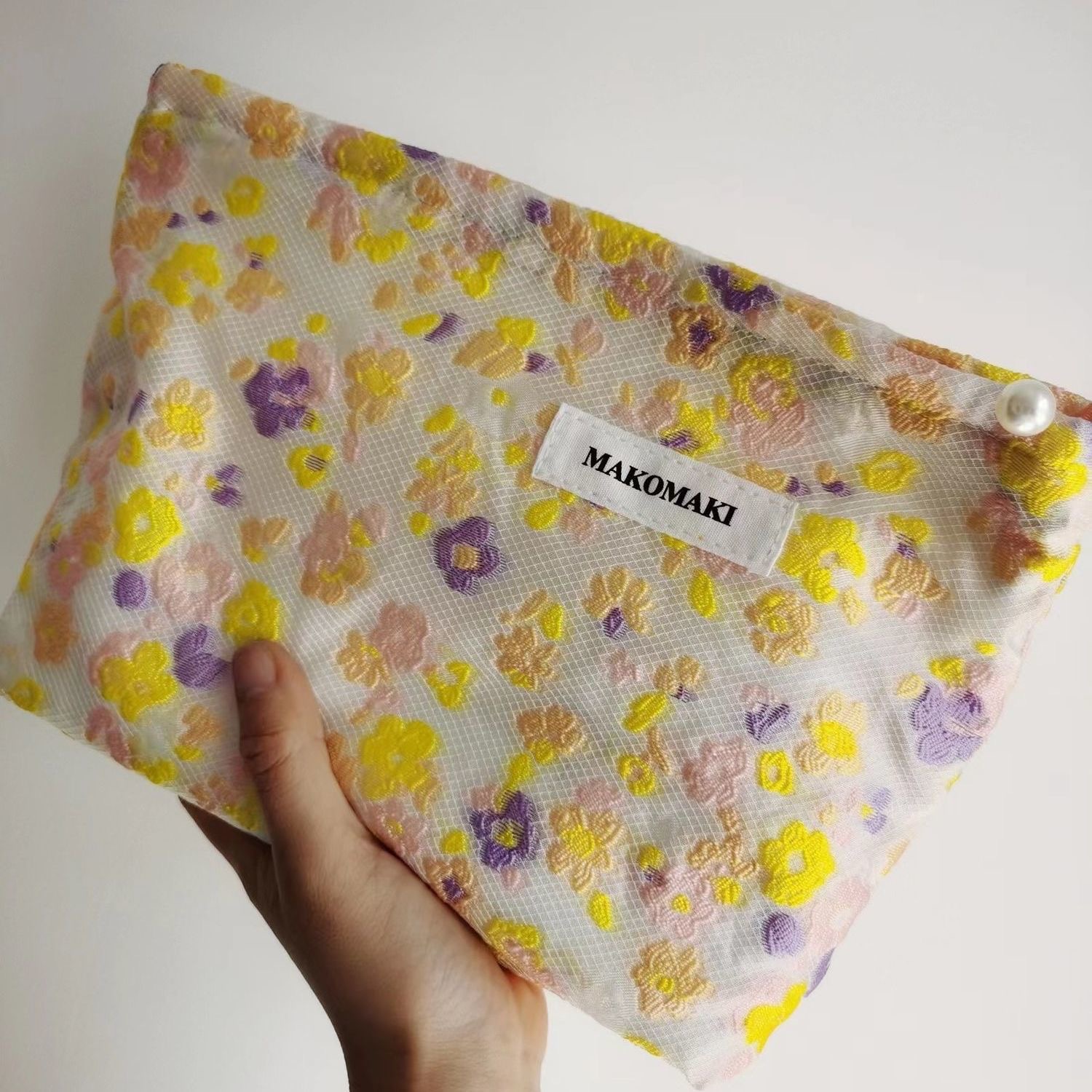 Bolsa de cosméticos de gran capacidad portátil fresco pequeño floral ins bolsa de almacenamiento bolsa de lavado elegante bolsa de almacenamiento jacquard