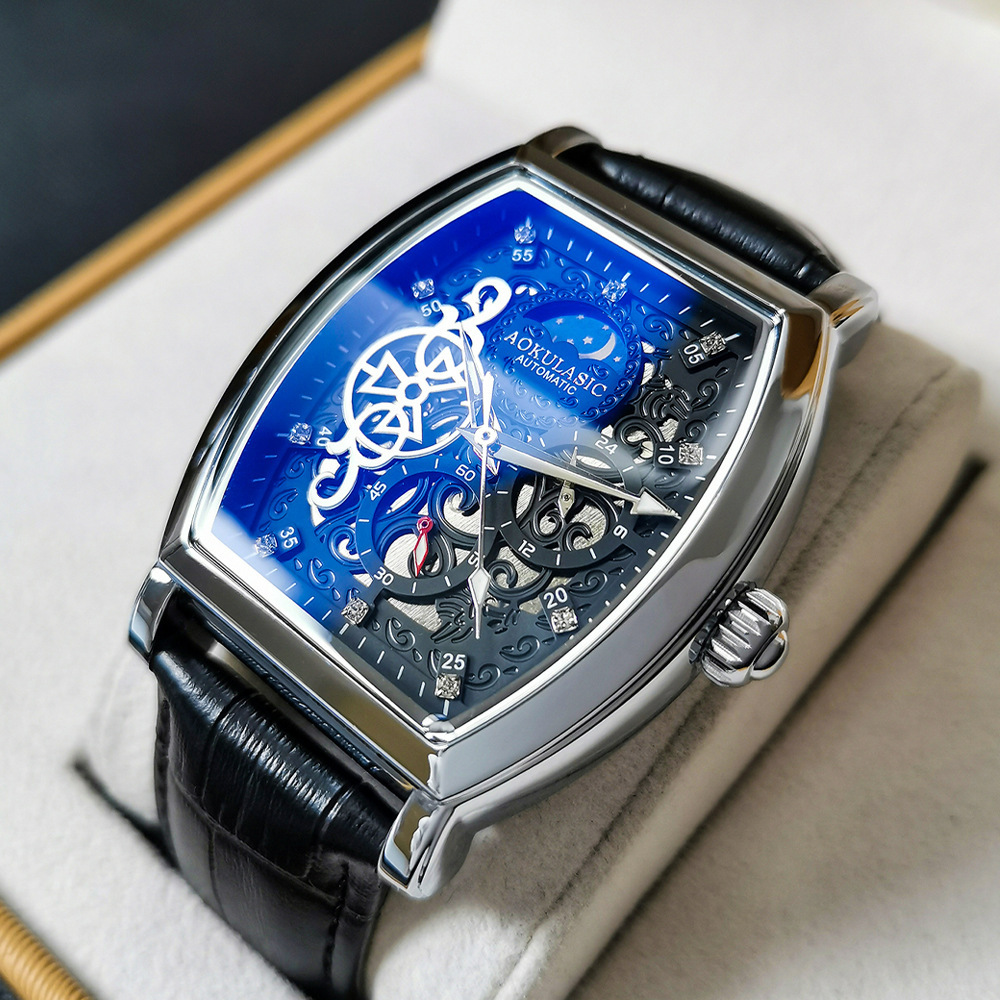 Barril de vino Reloj mecánico automático hueco-hacia fuera transparente azul claro vidrio luminoso de cuero impermeable de los hombres hebilla de mariposa Mesa multifunción