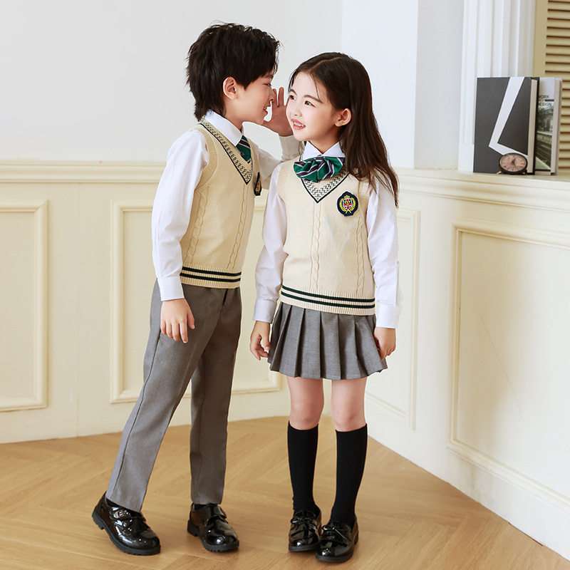 Uniforme escolar para estudiantes de primaria traje de primavera y otoño ropa deportiva de clase para niños primavera y verano jardín de infantes de cuatro piezas Ropa de jardín otoño algodón puro