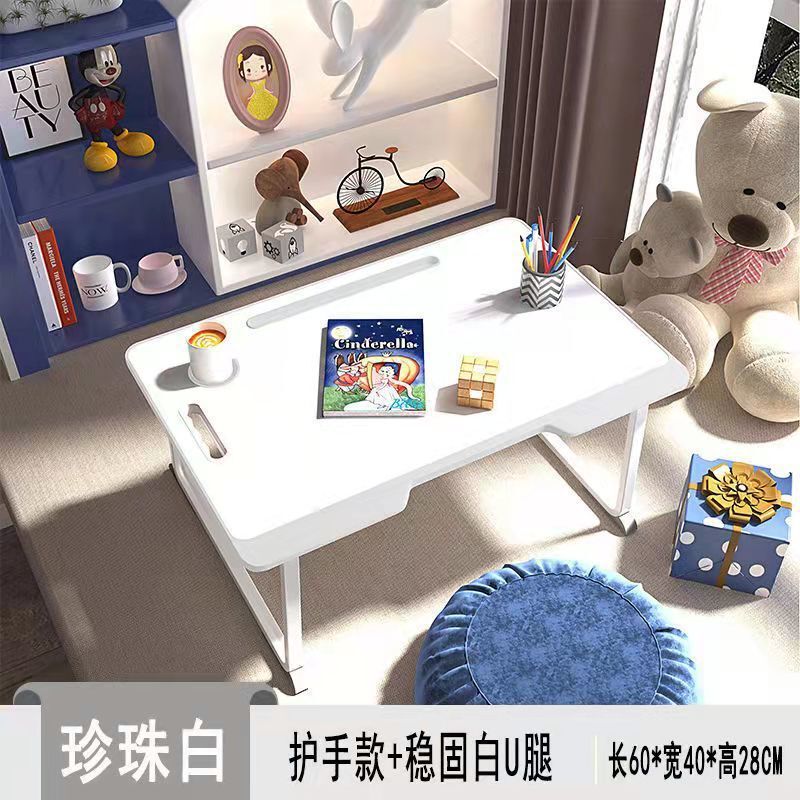 ベッドの上のノートパソコンの机の学生寮は小さいテーブルの部屋を畳むことができます。|undefined
