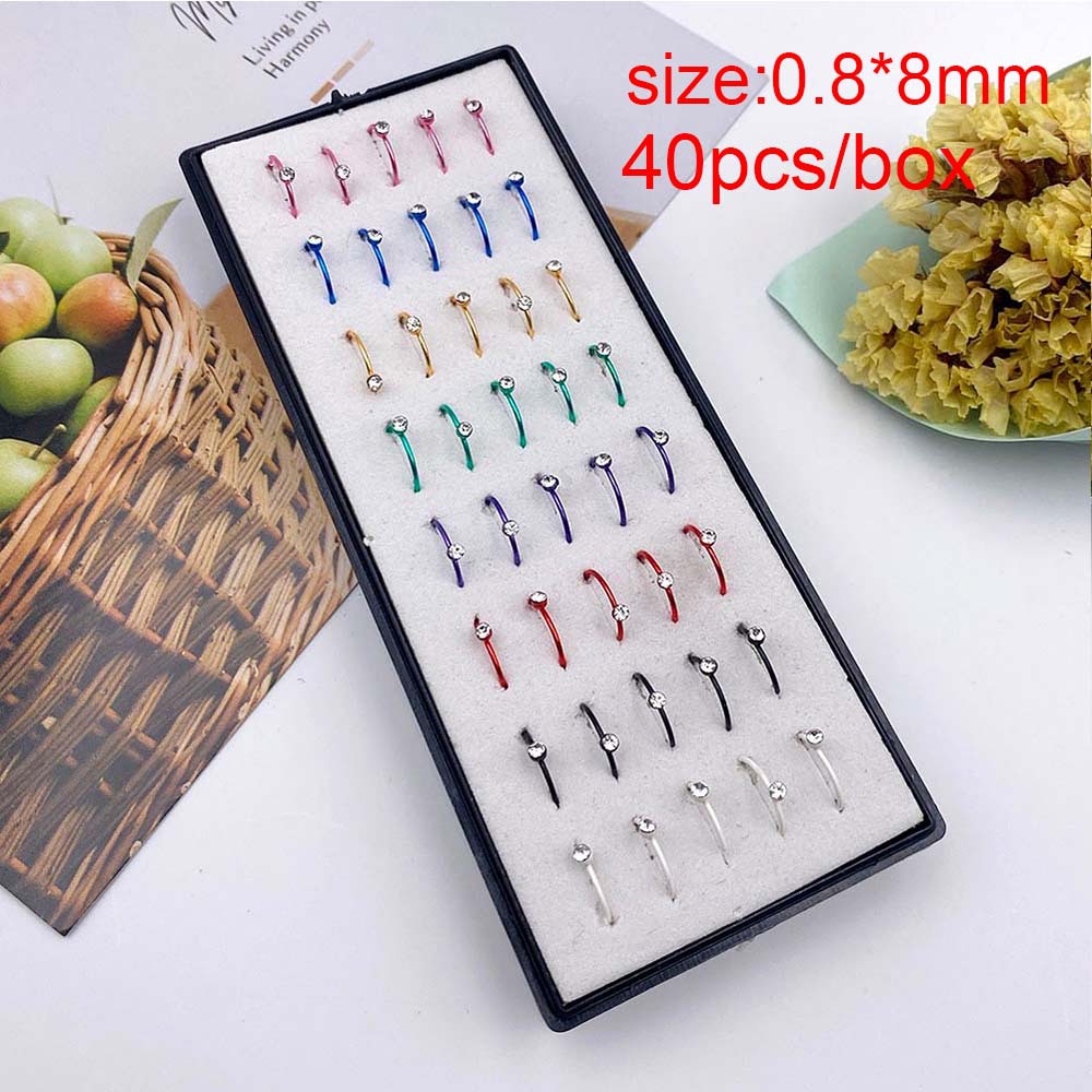 40 piezas/anillo de color en caja anillo de nariz de diamante blanco