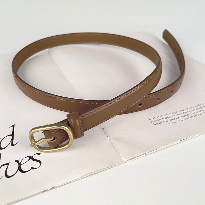 Correa delgada de cuero de las mujeres pantalones casuales pantalones vaqueros estilo coreano de moda todo partido simple de cuero de vaca cinturón de las mujeres