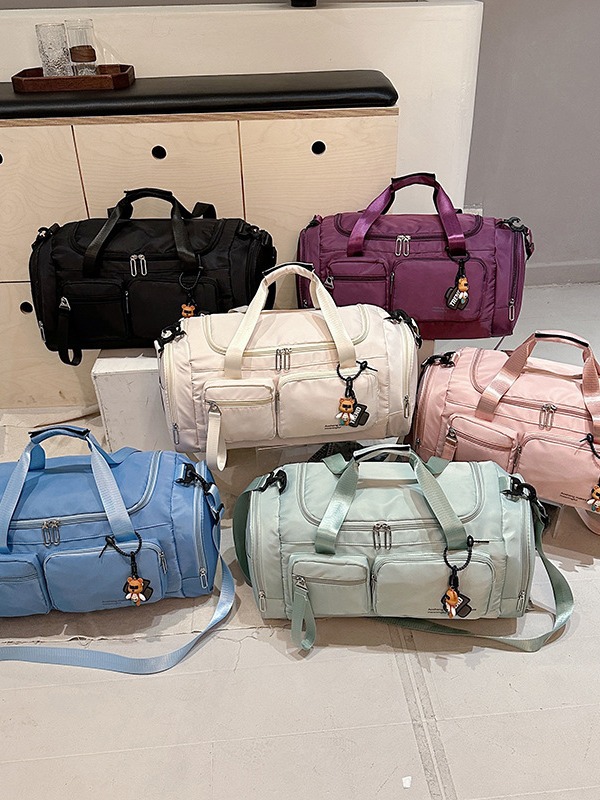 Bolsa de fitness de gran capacidad para viajes transfronterizos, modelo nuevo 2025, bolsa de viaje de corta distancia, bolsa multifuncional con separación de seco y húmedo, bolsa de equipaje compartimentada