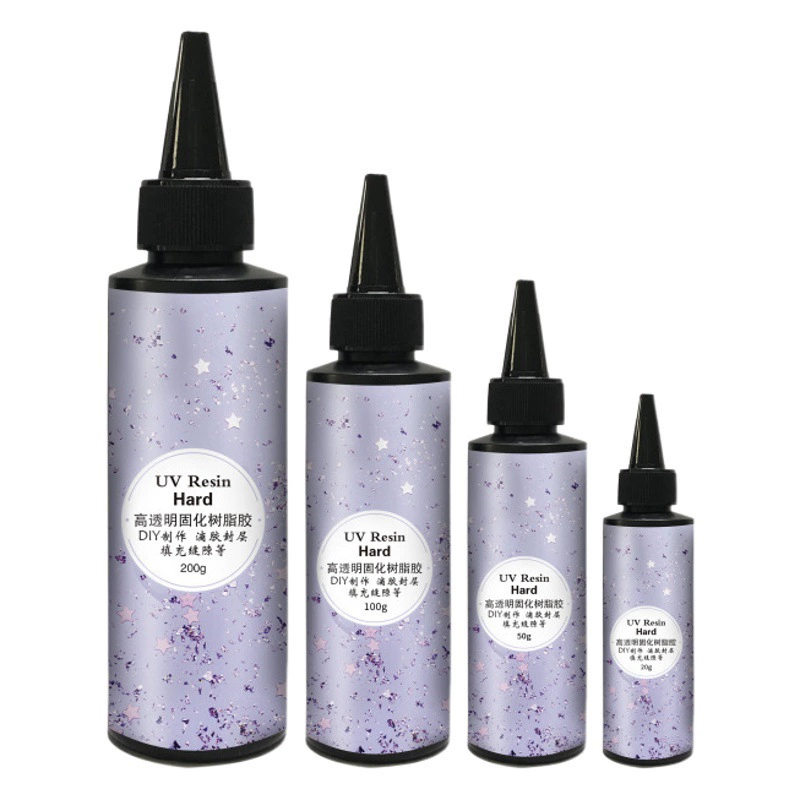В наличии УФ-отверждение Прозрачный кристаллический клей капли УФ-клей ручной работы Термоусадочная таблетка Промывочный клей Смола без запаха