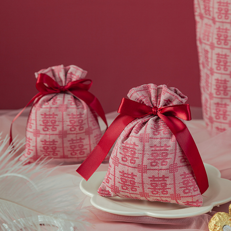 Boda nuevo estilo nicho estilo nacional Xi carácter bolsa de caramelo boda china sensación de mano caja de regalo boda caramelo caja de dulces