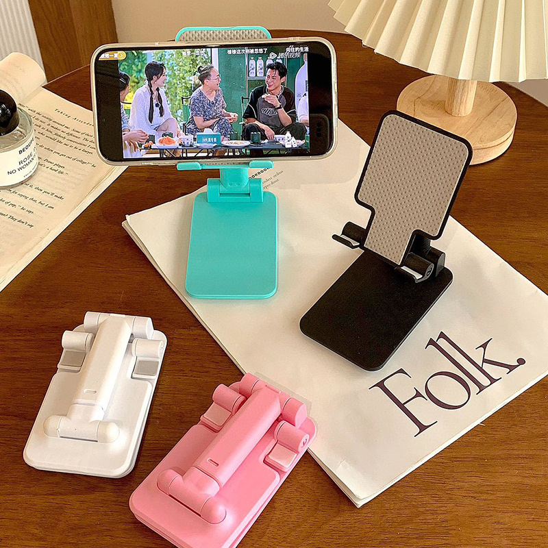 Phone holder for bed