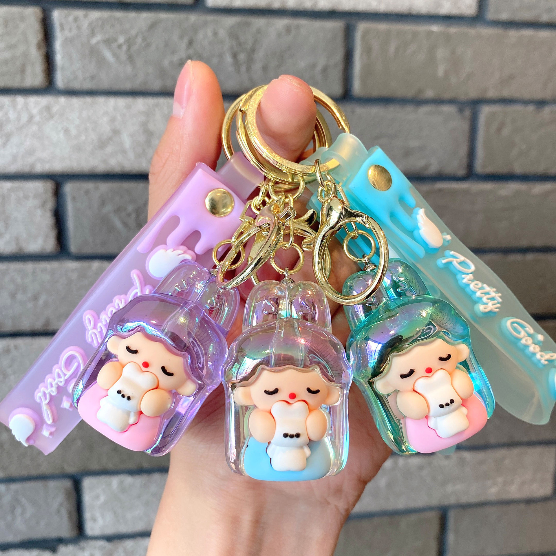 Acrílico transparente UV colorido dibujos animados lindos orejas de conejo llavero colgante pareja pequeña bolsa de regalo accesorios